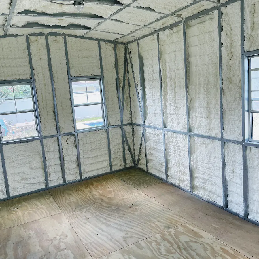 Closed-cell spray foam insulation applied to wall cavities in a residential project in Littleton